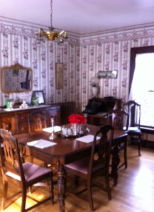 The dining room with historically accurate wallpaper.