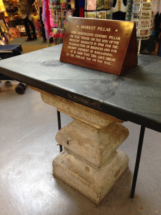 This market pillar is in the Guildhall markets. It dates to 1768.