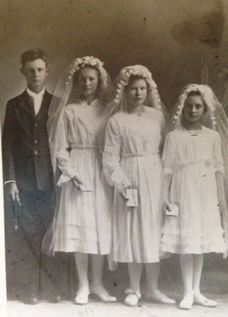 Some of the Hollinger children at their First Communion. From left, Andrew, Catherine, Irene, and Anna. Irene is Kathleen's mother, and Anna is my grandmother.