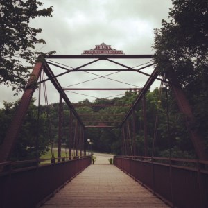 A pedestrian bridge over the river.