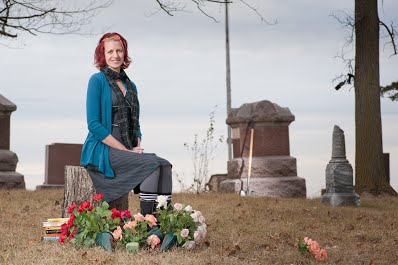 My author photo by Steven Pottenger. I love this photo so much, and am so grateful to my friend Steven for taking it. We went to a small cemetery outside of Eagle Lake, Minnesota, in late fall.